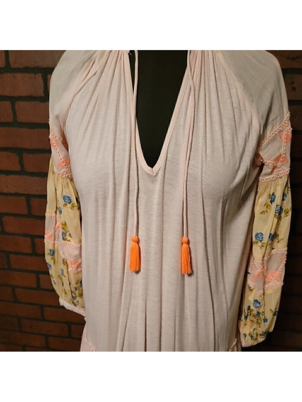 Free People pink dress with mixed material beaded/embroidered sleeves.